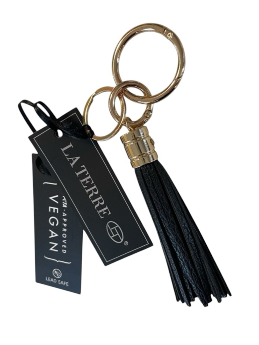 LA TERRE Tassel Keychain/ Bag Charm. Black with gold accents. Vegan leather